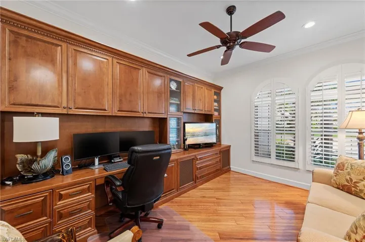 Custom built-in cabinetry and desk with multiple storage options