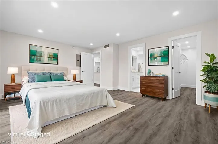 Bedroom featuring recessed lighting and wood finished floors