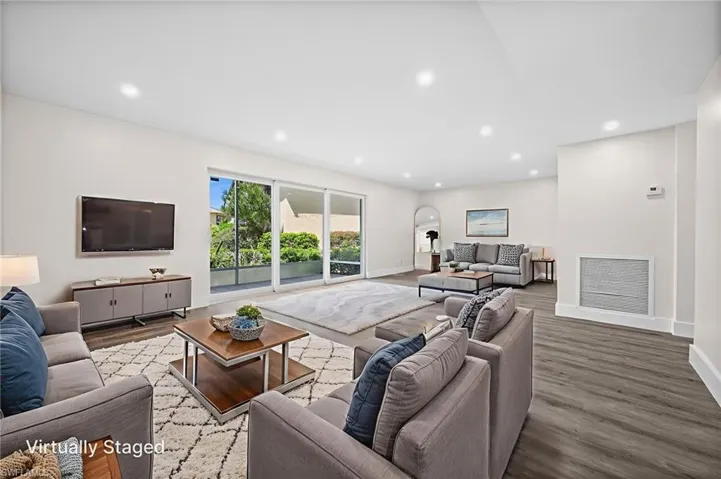 Living area featuring recessed lighting and wood finished floors