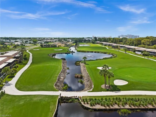 Aerial view of a nearby body of water and a local golf course