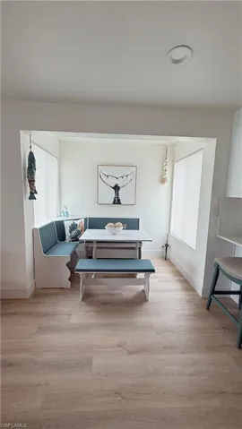 Integrated dining nook with built-in bench seating and a coordinated standalone bench