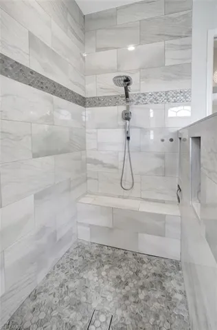 Bathroom with tiled shower