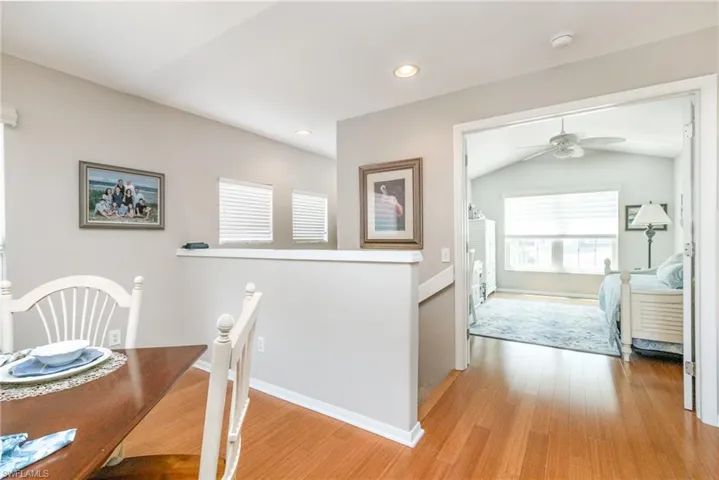 Dining area - Den/Bedroom view light wood-style floors, ceiling fan, baseboards, recessed lighting, and lofted ceiling