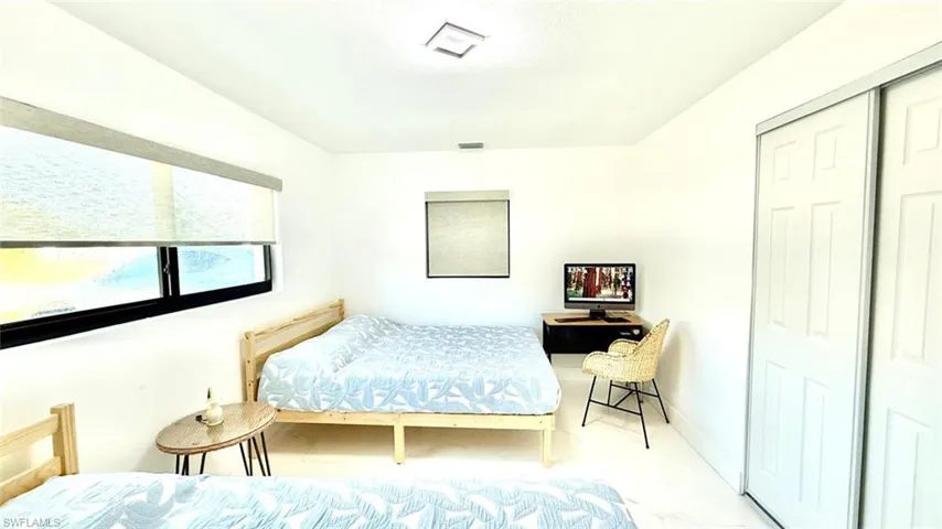Bedroom featuring a closet