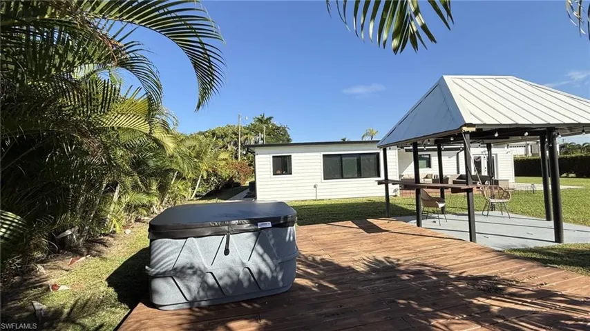 Wooden terrace with a yard