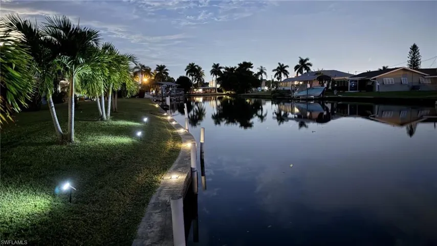 Water view with a dock