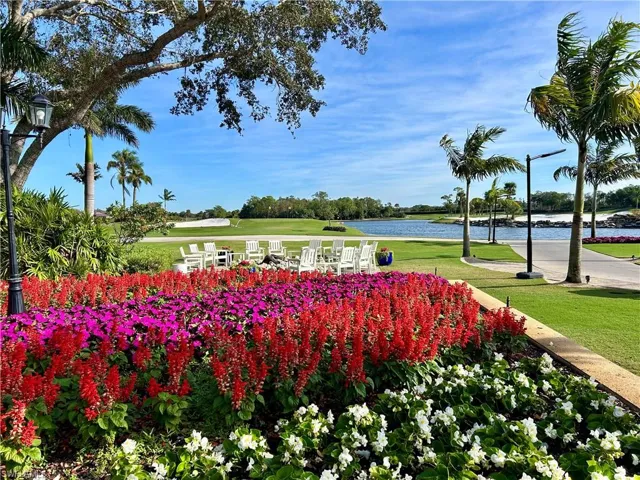 Surrounding community featuring a yard and a water view