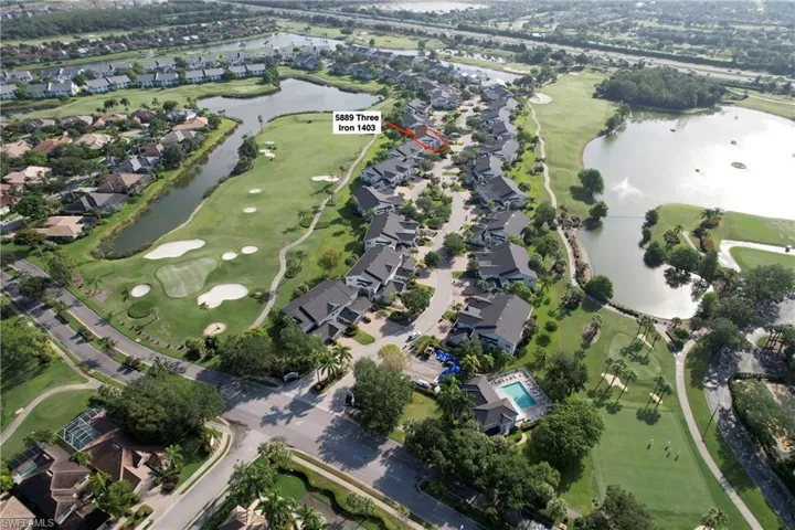 Bird's eye view featuring golf course view, a residential view, and a water view