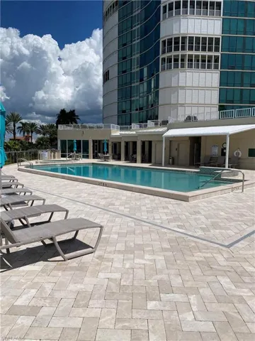 Community pool featuring a patio area