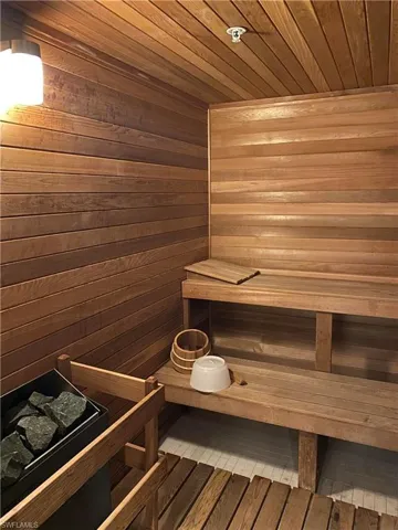 Sauna with wood ceiling and wood walls