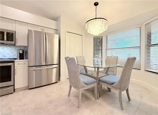 Breakfast room with pantry, new designer lighting and bay window