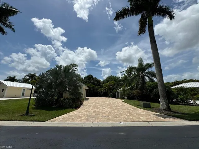 View of front of house with a front yard