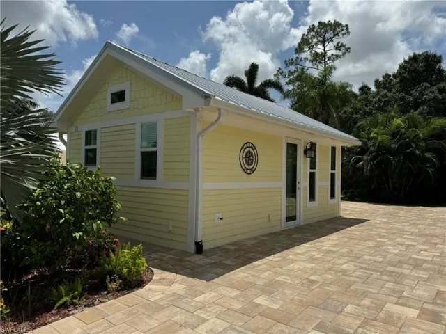 View of property exterior with a patio area