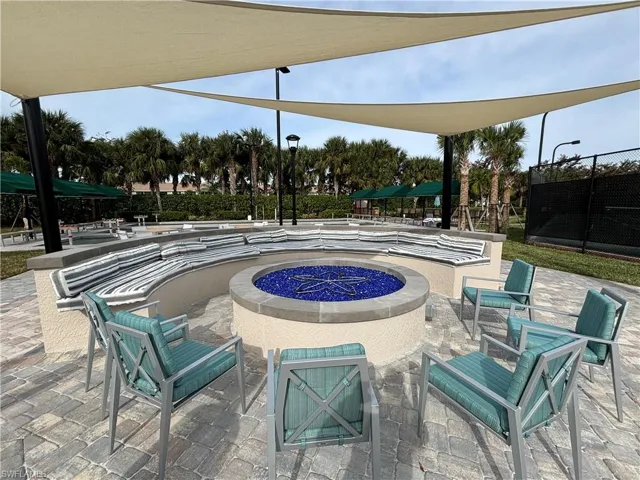 View of patio / terrace with a fire pit