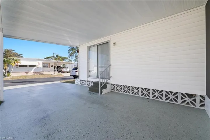 Covered porch with a carport