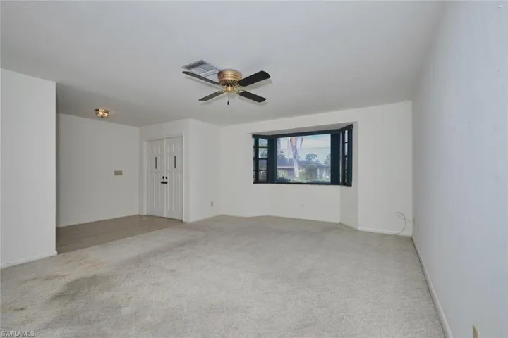 Nice size living room/dining room combination.  Picture window and plenty of wall space.  Carpet is clean but will have to be replaced as the spots were hidden under the furniture!