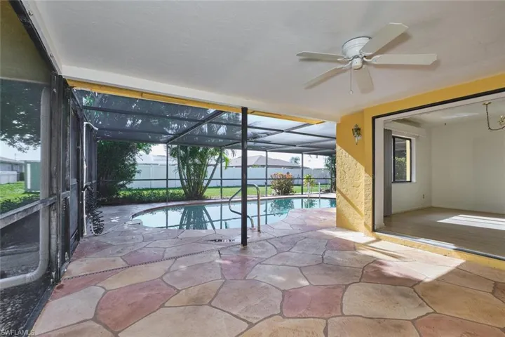 What an inviting view!  Yard is partially fenced with plenty of mature landscaping.
