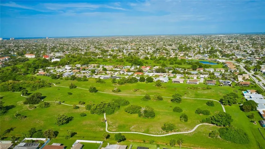 Aerial view of home and neighborhood.