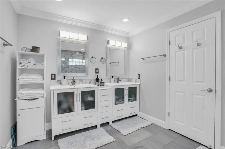 Dual vanity sink and decorative light fixtures with dimming capability