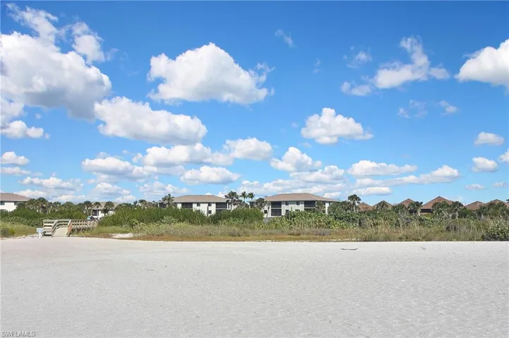 View of asphalt road with a residential view
