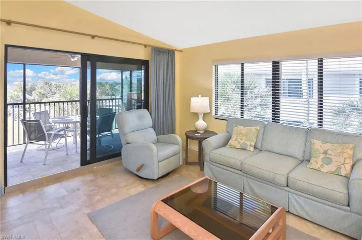 Living area with lofted ceiling