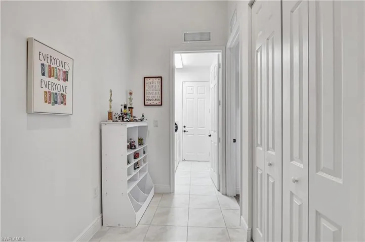 hallway to room 3 & 4 with room for desk or playspace