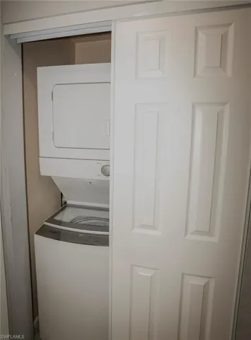 White paneled bi-fold door