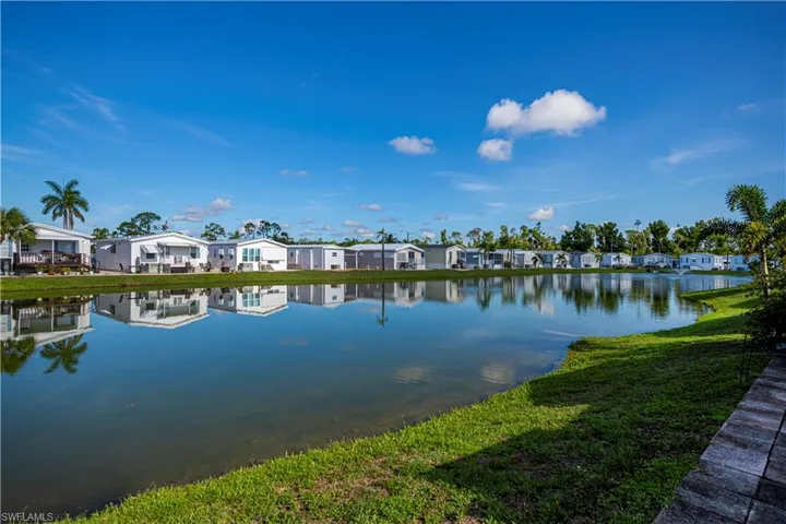 Water view featuring nearby suburban area