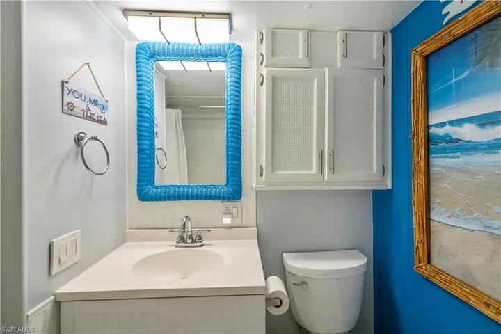 Full bathroom featuring vanity and toilet