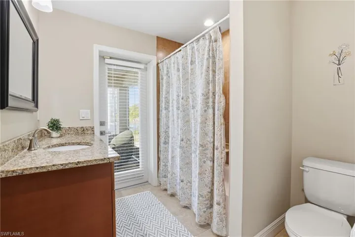 2nd bathroom doubles as pool bath.