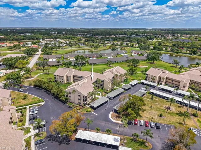 Bird's eye view featuring a water view and a residential view