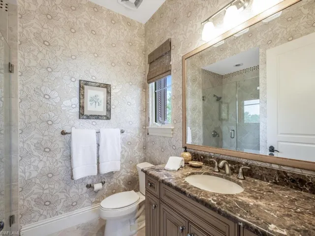 Bathroom 3 featuring a shower stall