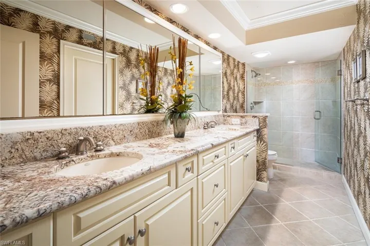 Master bath features double vanities and walk in closet