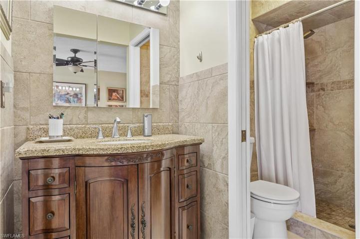Master Bathroom with walk in shower - walk in closet to left on sink area