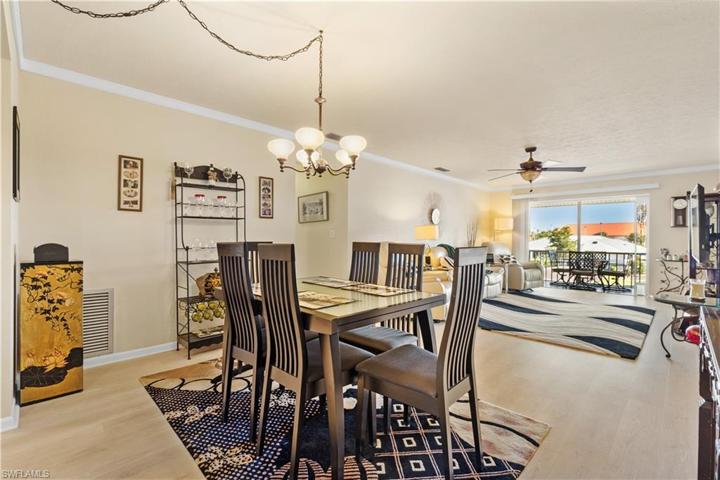 Dining area (includes table (Can expand for additional seating) and view of living room facing lanai