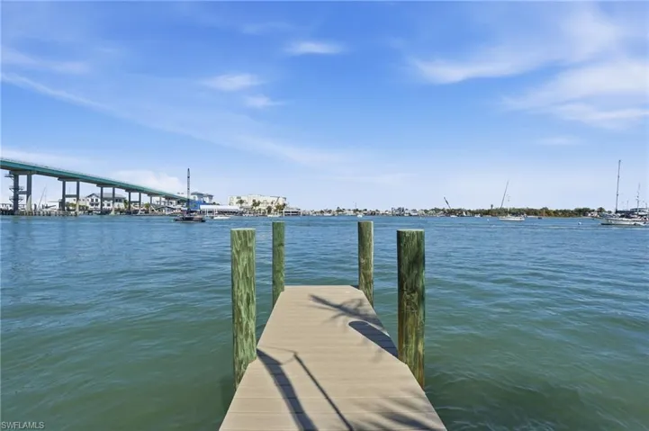 Dock featuring a water view - Virtually Edited Image