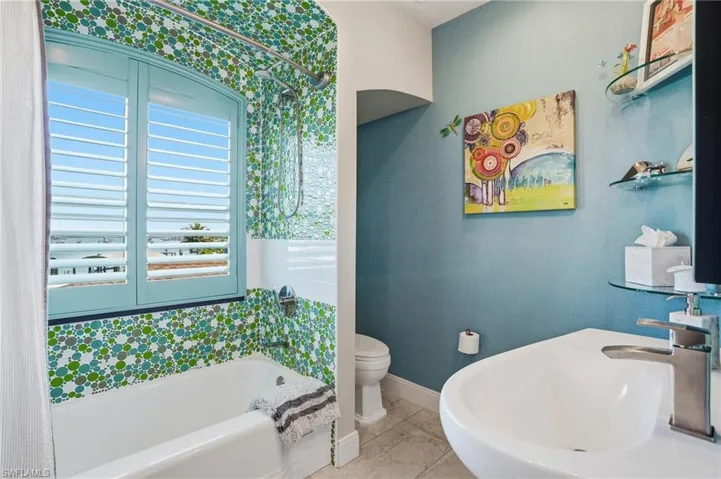 Full bath with toilet and a garden tub - Virtually Edited Image