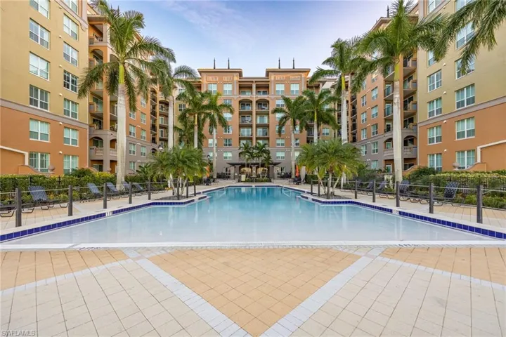 Community pool featuring a patio