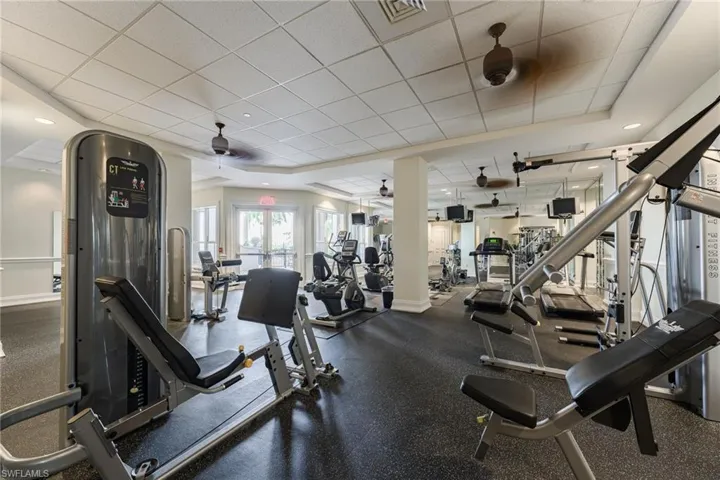 Workout area with a paneled ceiling