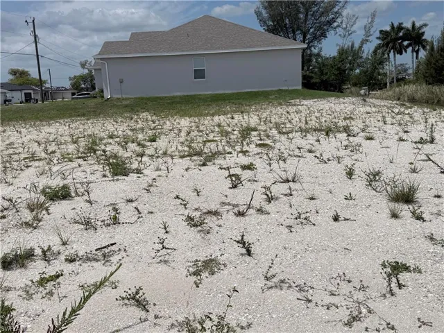 facing east, west side of property