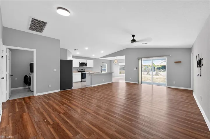 Living Room w/Vaulted Ceilings!