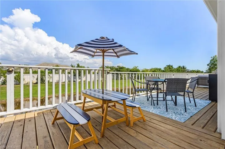 Wooden terrace with outdoor dining area