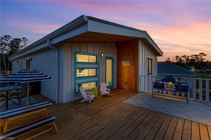 View of deck at dusk