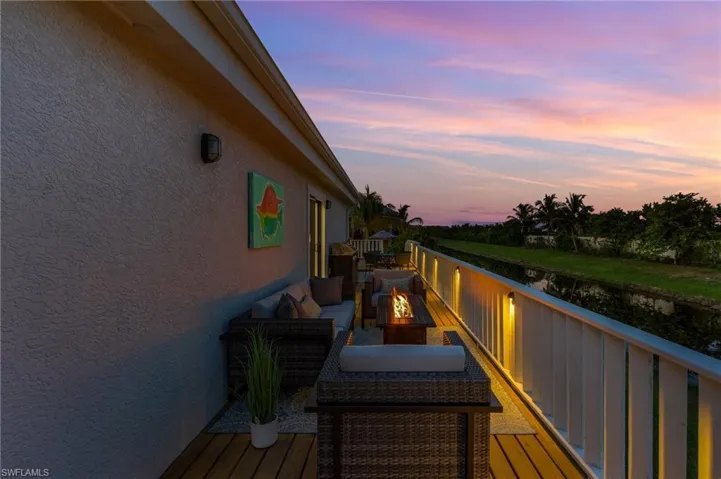 Deck featuring an outdoor fire pit