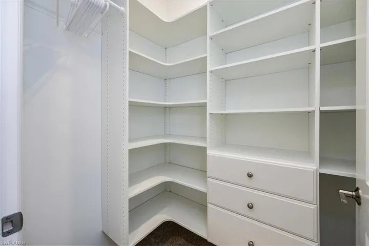 View of spacious custom closet #1 in Master