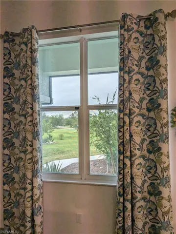 Doorway featuring plenty of natural light