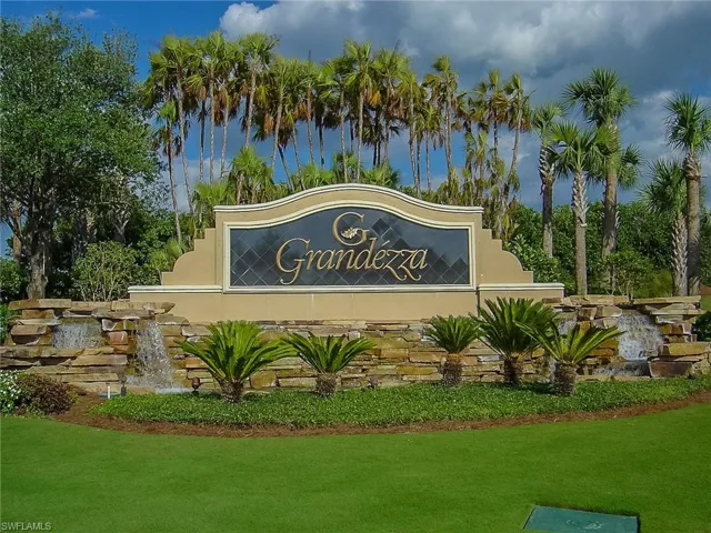 Community sign with a lawn