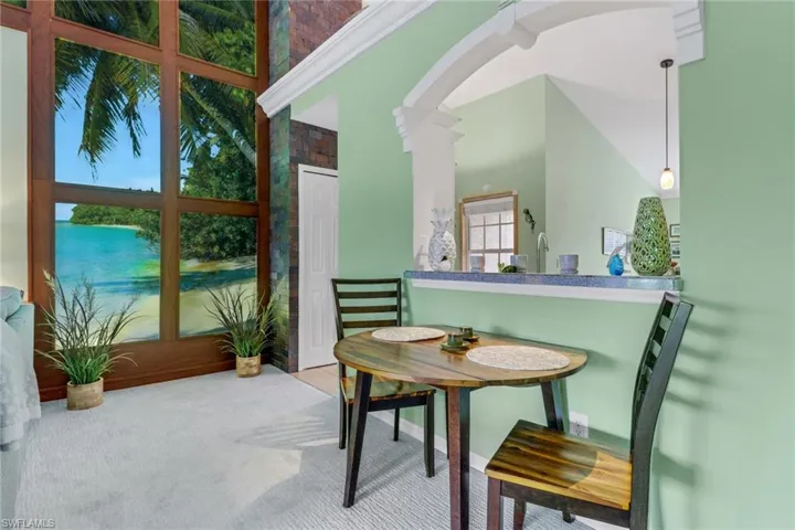 Sunroom / solarium featuring arched walkways