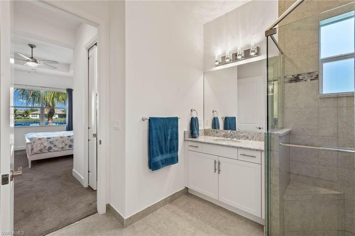 Corner, large shower and 2 sinks present!