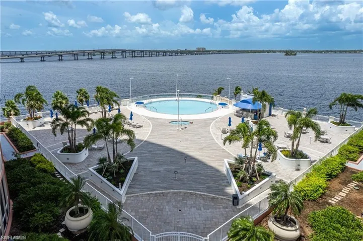 View of swimming pool with a water view